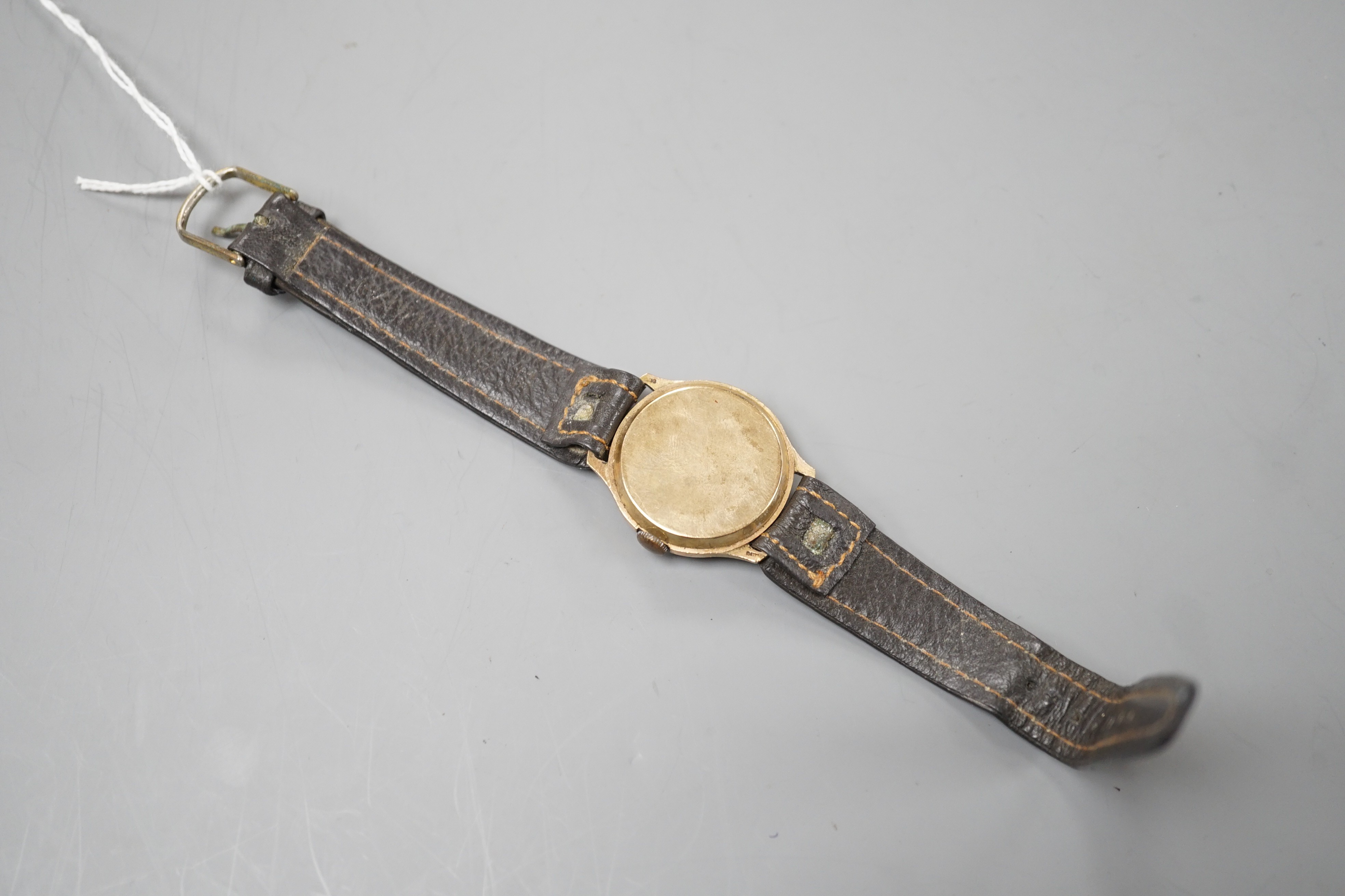 A gentleman's mid 20th century 9ct gold Cyma manual wind wrist watch, retailed by Collingwood, on associated? leather strap, case diameter 28mm.